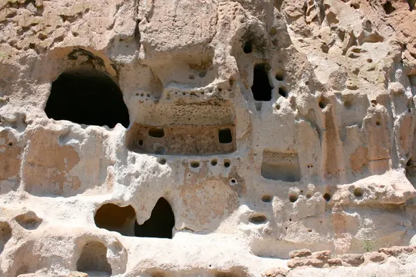 Cavates carved into the cliff