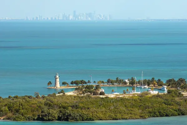 Boca Chita lighthouse and the Miami skyline
