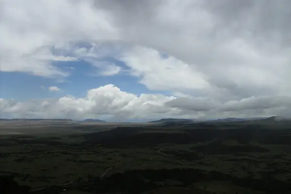 The volcano rises from the plains