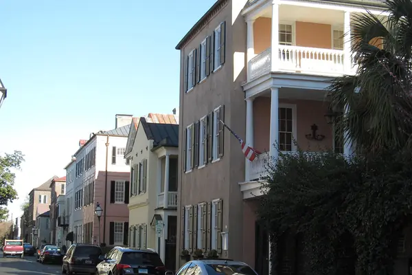 Historic homes beneath a church steeple