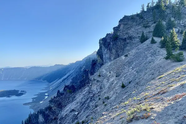 Cliffs above the blue water
