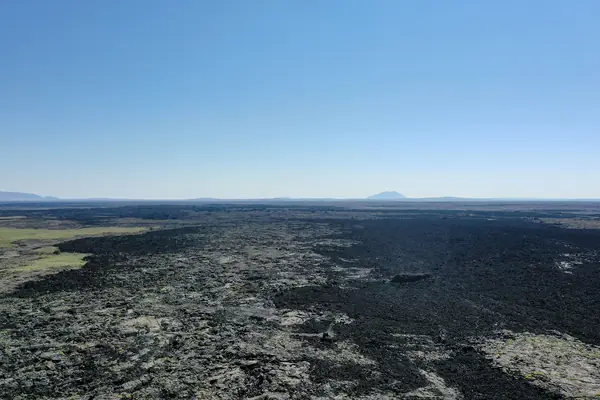 A cinder cone on the lava plain