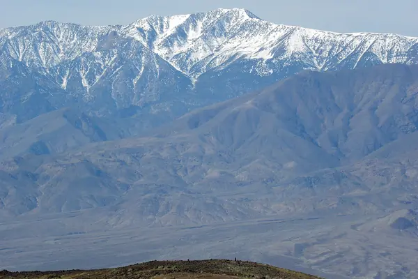 Snow on Telescope Peak above the valley