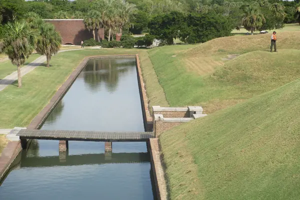 The moat encircling the fort