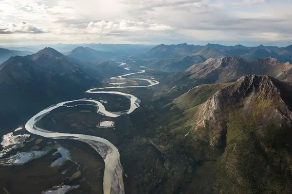 A wild river winds through the range
