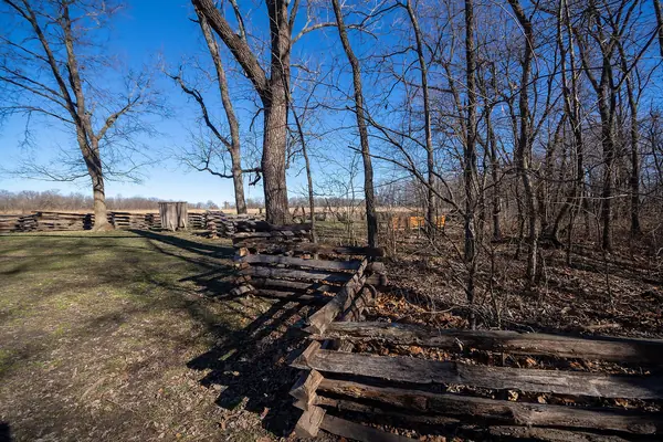 Split-rail fences across the prairie