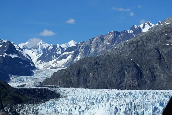 A glacier spills toward the bay