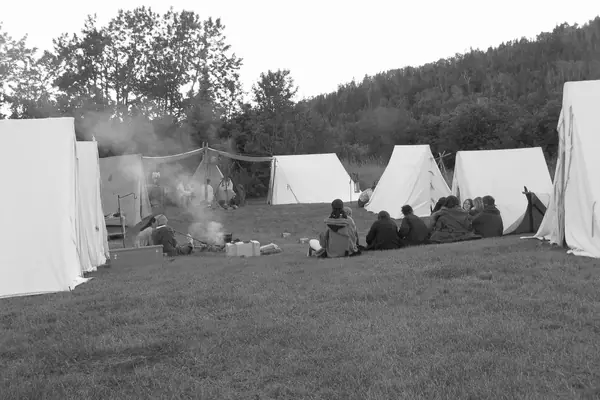 A fur-trade rendezvous encampment