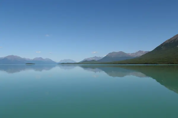 Turquoise Lake Clark below the peaks