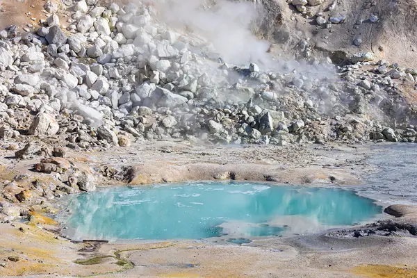 An aquamarine hot pool at Bumpass Hell
