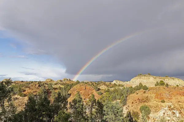 A rainbow over the badlands