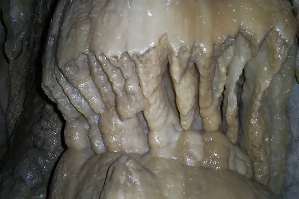 Formations along the cave wall