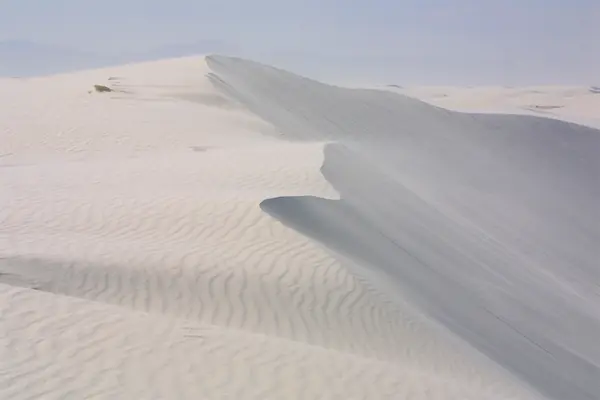 Rippled white sand
