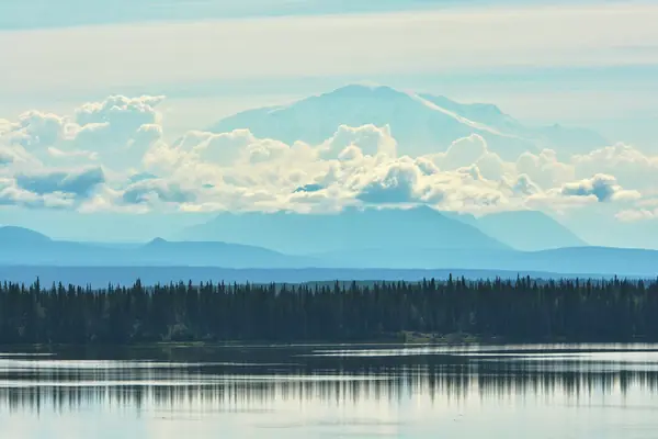 Mount Blackburn mirrored in a lake